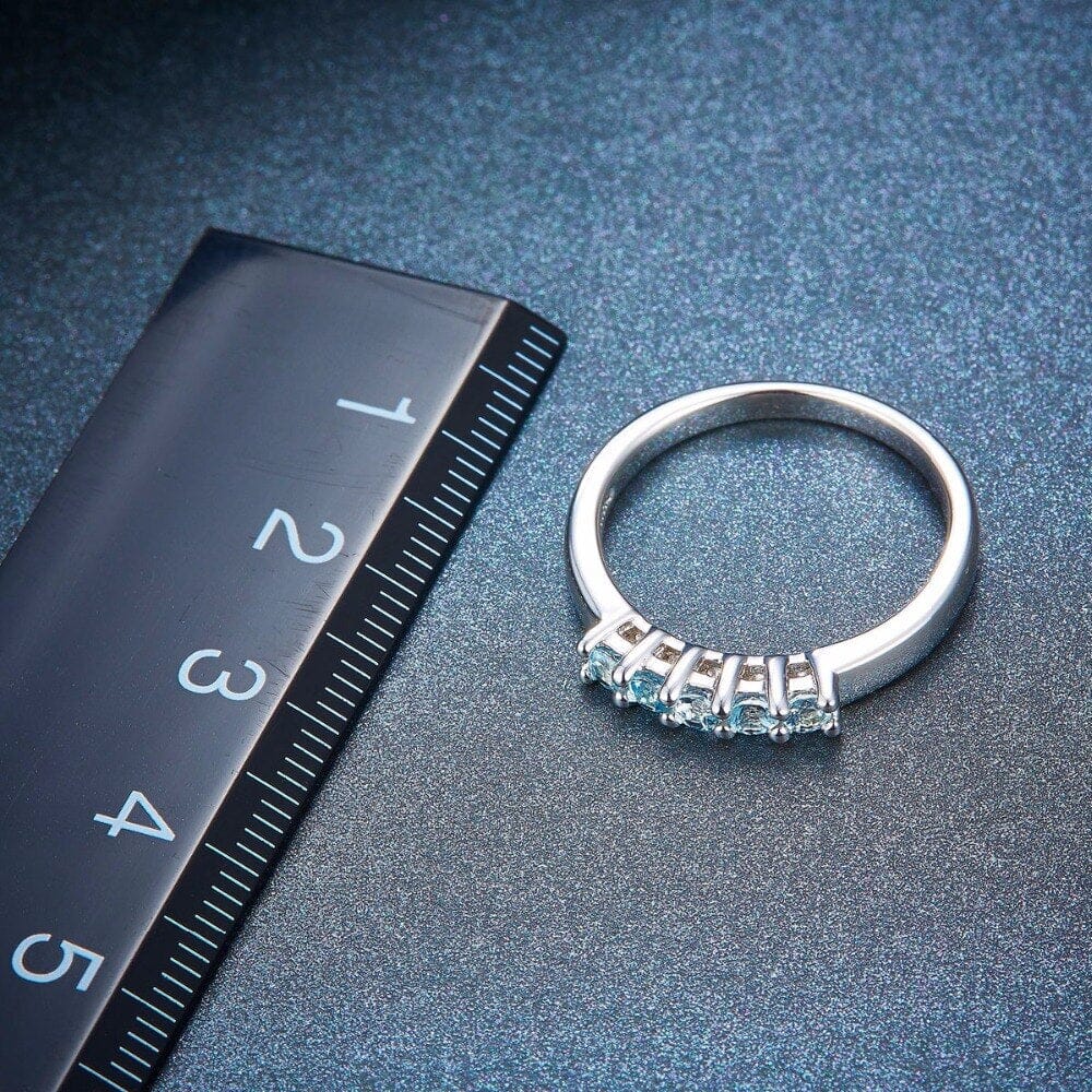 Five Round aqua stone Ring