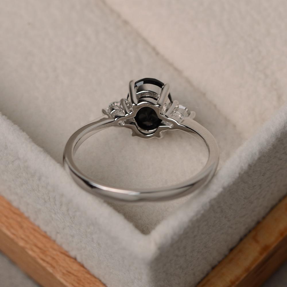 OVAL BLACK SPINEL RING