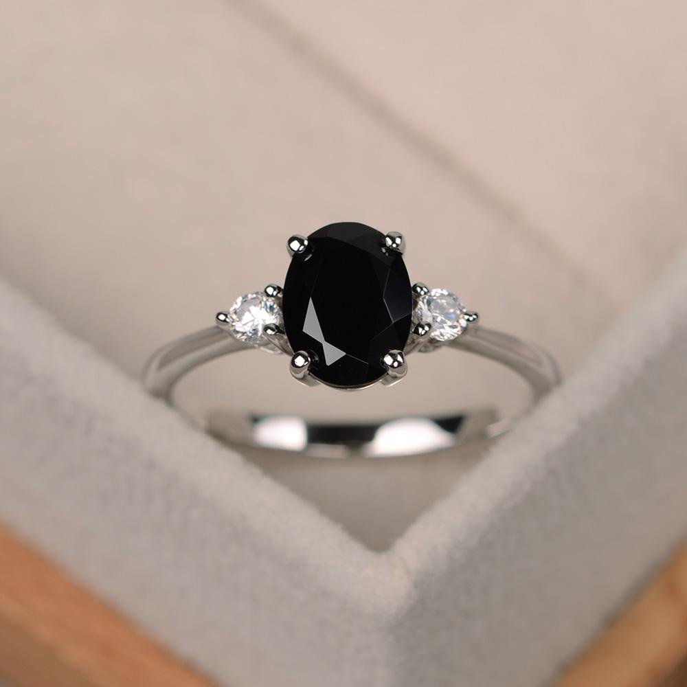 OVAL BLACK SPINEL RING