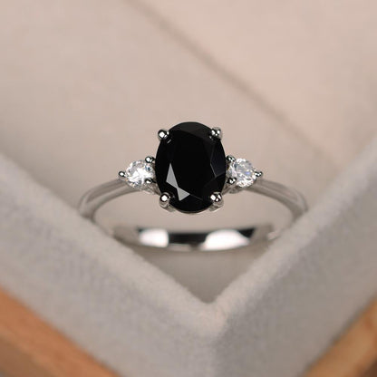 OVAL BLACK SPINEL RING